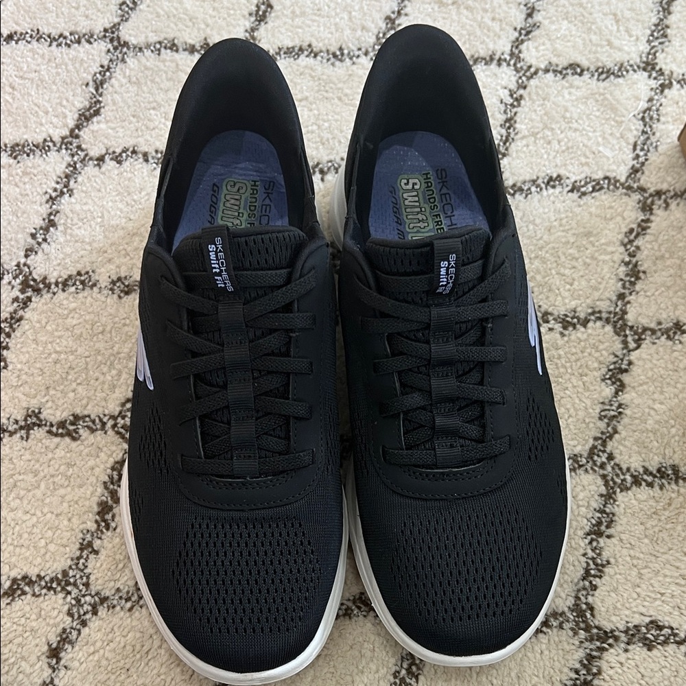 Skechers women’s Black Lace-Up Slip-On Sneakers with White Accents